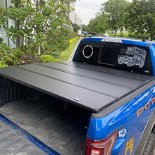 Load image into Gallery viewer, MTNTOPCN Aluminum Quad Fold Tonneau Cover Compatible for 2015-2024 Ford F150 Double Cab/Crew Cab (SuperCrew) (incl. Raptor/Lightning) 5' 7" Bed (67.1")